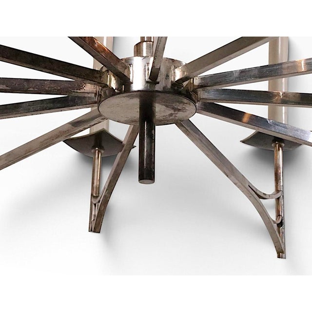 Large and impressive Hollywood Regency style silver plate spoke form chandelier, in good, clean and working condition....