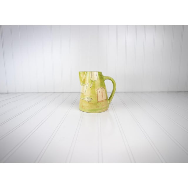This piece from comes from an eclectic estate auction in Minneapolis that had a wide variety studio pottery in their...