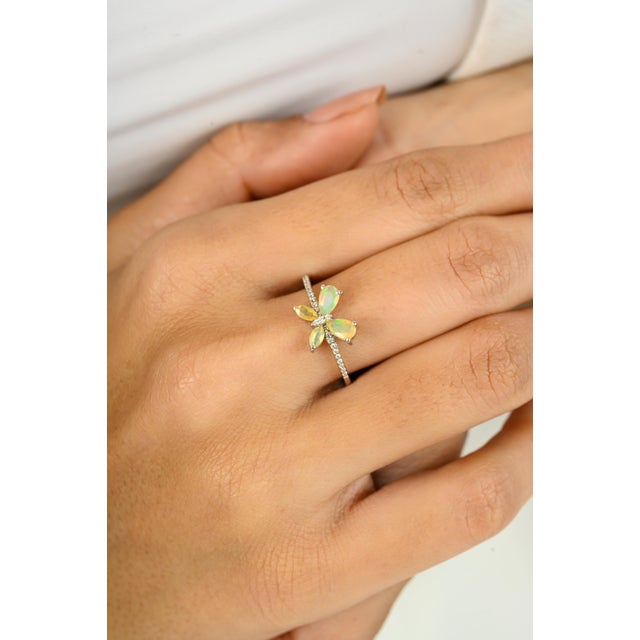 Embrace whimsical elegance with this stunning 14K Solid White Gold Butterfly Ring, designed to captivate with its delicate...