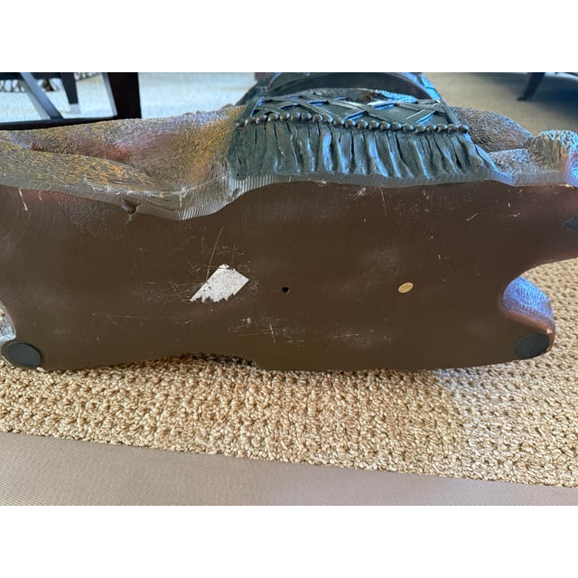 This adorable resting camel will bring joy to any room. He has a serene look to him with his legs turned under and head...