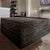 Discontinued Four Hands Maya coffee table handcrafted from reclaimed wood with intricate geometric carving inspired by...