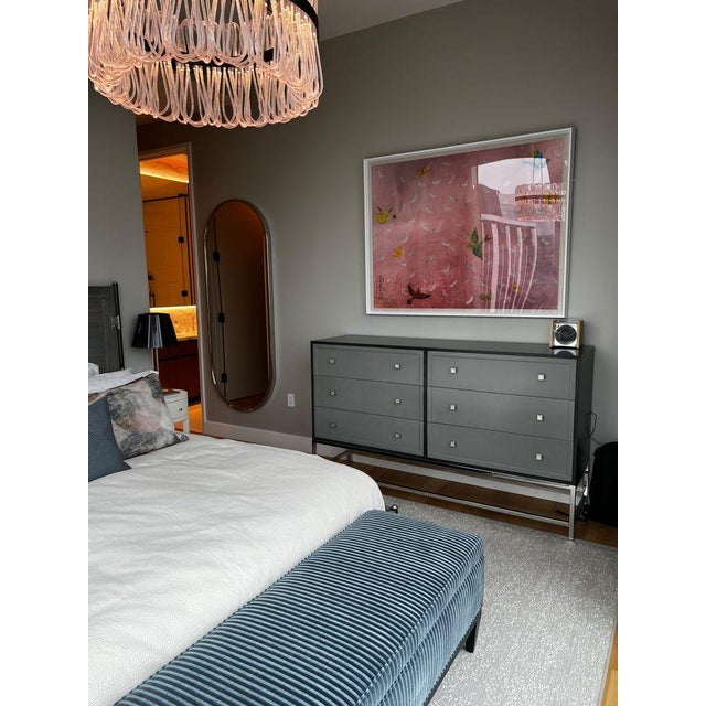 Custom Dresser from Century Furniture A modern gray 6-drawer dresser with a dark frame and a polished open metal base. 72”...