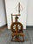 Design Plus Gallery presents an Antique Upright Wooden Spinning Wheel. The vertical frame supports a large drive wheel,...