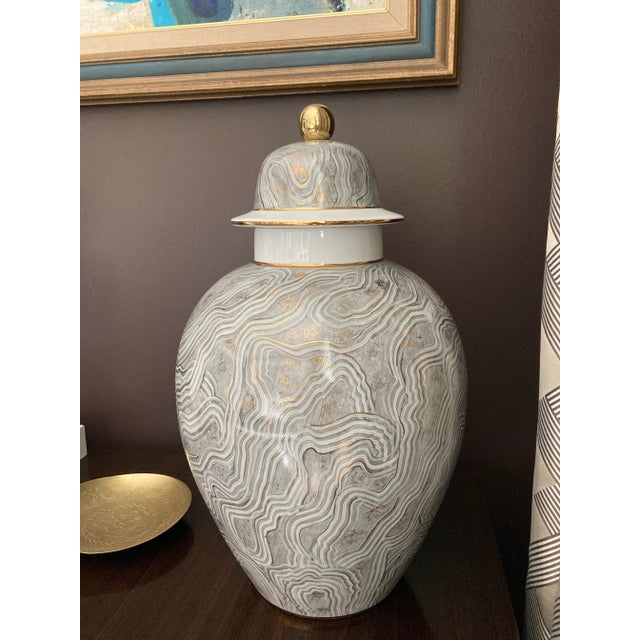 Add sculptural presence and understated elegance with this substantial Chelsea House lidded urn. Crafted of white glazed...