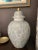 Add sculptural presence and understated elegance with this substantial Chelsea House lidded urn. Crafted of white glazed...