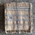 Beautiful hand-loomed throw woven with naturally dyed wool. Featuring a subtle geometric pattern with classic stripes to...