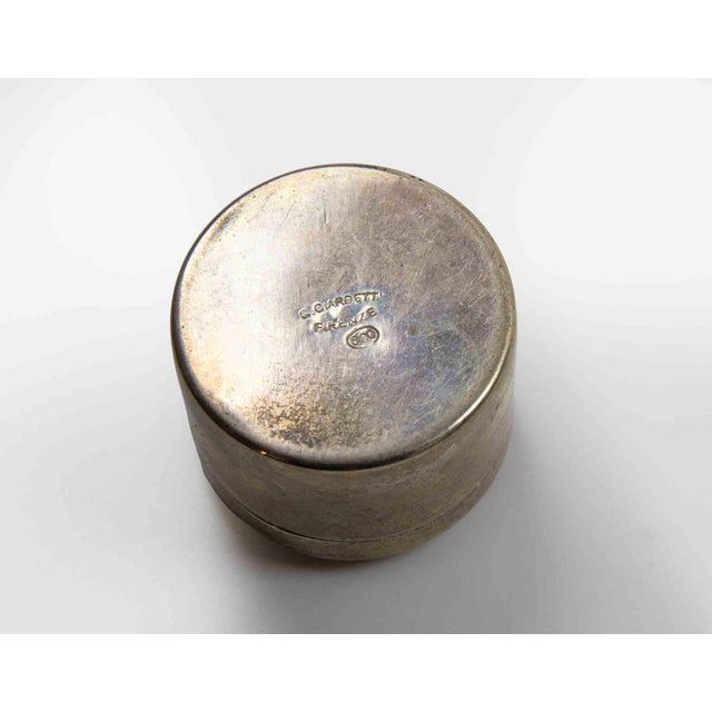 A finely crafted cylindrical silver 800 box by Italian silversmith Ciardetti of Florence (“Firenze”). The lid features...