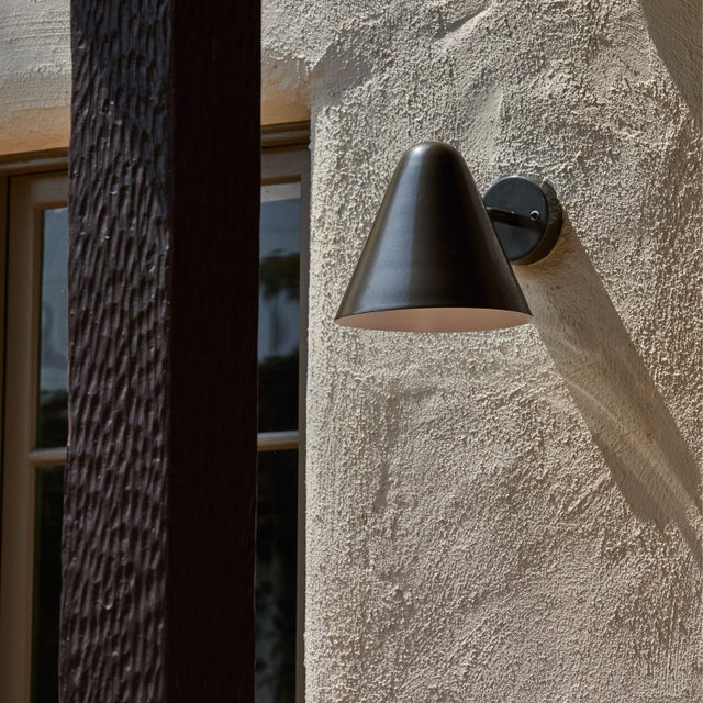 'ZuZu' Bronze Painted Brass Wall Sconce in the Style of Jacques Biny An exclusive made for U.S. and UL listed wall sconce...