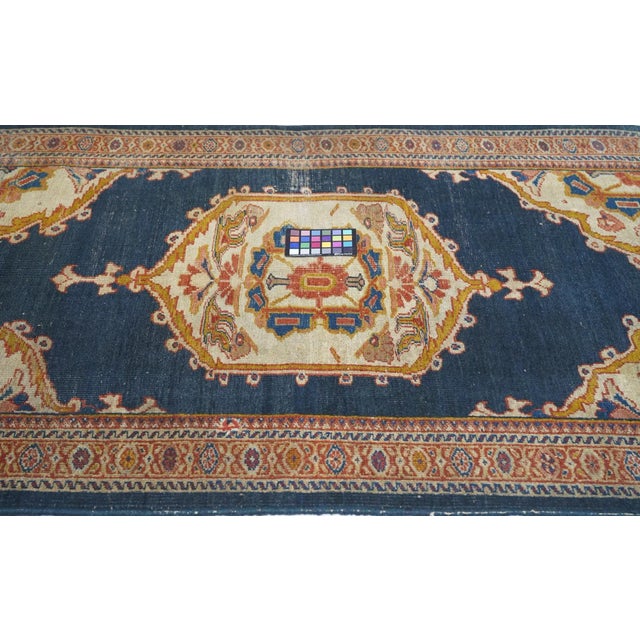 The rustic character of this west Persian, Arak Province scatter is well displayed by the lateral offset in the central...