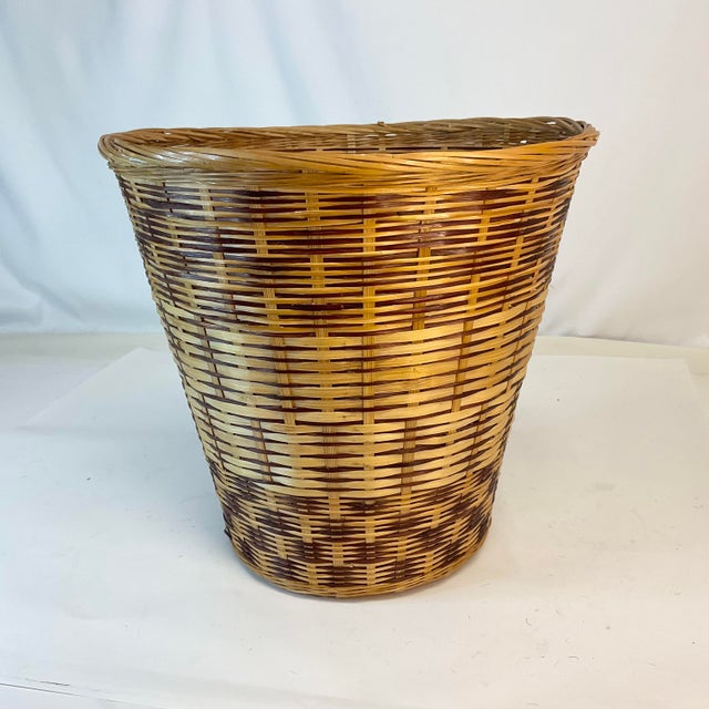 A great addition to any room. This Mid-Century woven split reed wastebasket will provide a great function with a touch of...