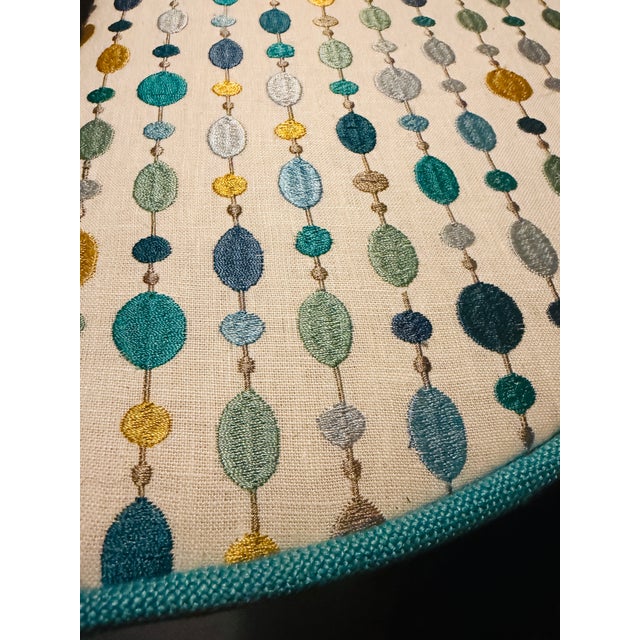 Custom upholstered window valance in Lee Jofa embroidered linen — chains of hand-embroidered dots in teal, peacock, aqua,...