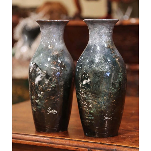 Decorate a mantel or a buffet with this elegant pair of antique Majolica vases from France. Crafted in the northern city...