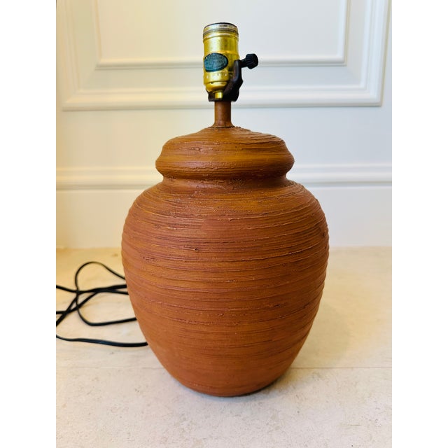 Charming Vintage Rustic Terracotta Table Lamp. Handmade feel to this mid-century cabin or lodge style piece. Made of heavy...
