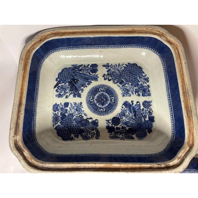A handsome Chinese export porcelain covered entrée dish decorated in the classic blue-and-white Canton palette, dating to...