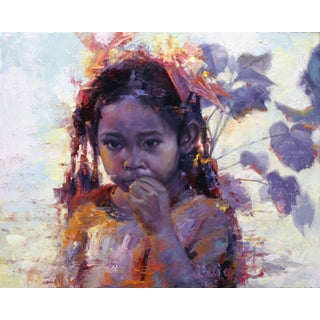 Thai Girl by Chris Hopkins | Oil Painting of a young girl with dark hair and a pensive expression For Sale