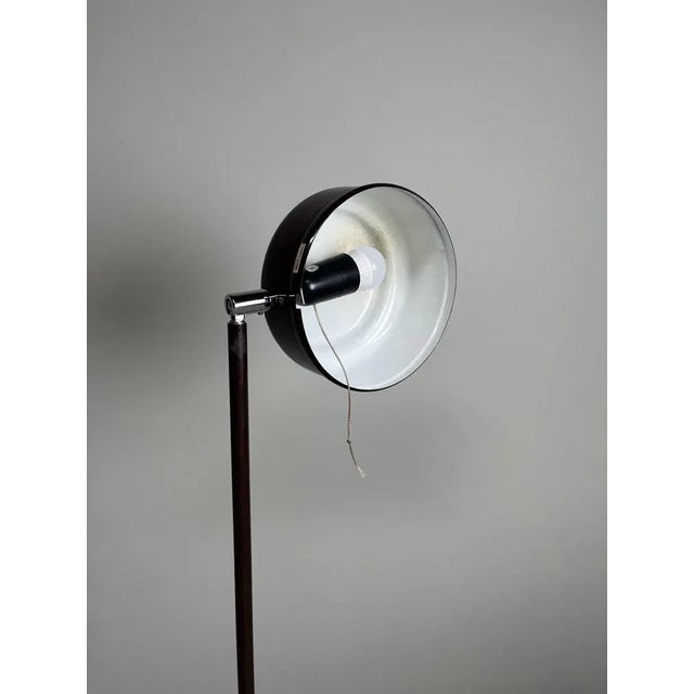 Beautiful Swedish metal designer floor lamp. Sleek, simple design. Lampshade can rotate in all directions. In nice used...