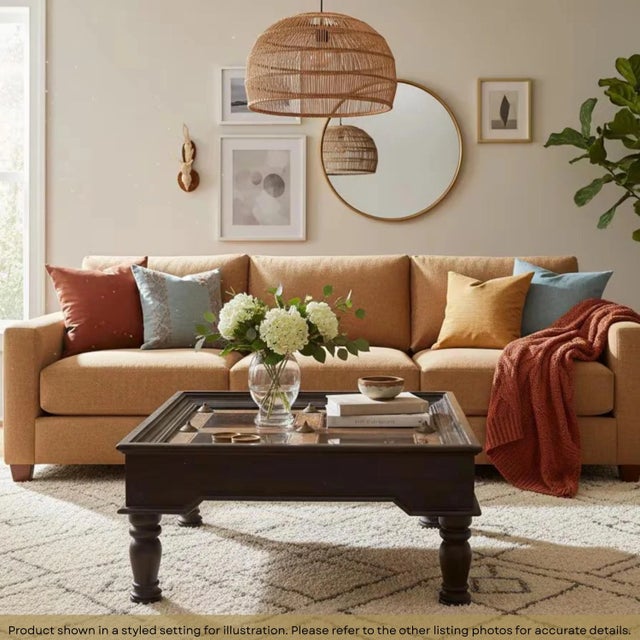 Dimensions: 37" W x 37" D x 18.5" H Add a touch of history and rustic charm to your living space with this unique coffee...