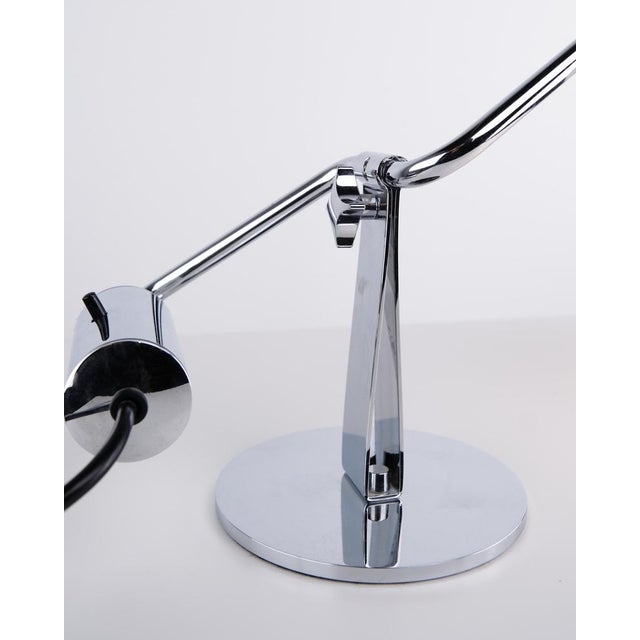 Ph 2/1 piano/tilt lamp designed by poul henningsen and produced by louis poulsen. The lamp is made with shades in white...