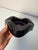 Iconic design from the late 1960s: This black ashtray by Helit embodies the timeless functionalism and distinctive style...