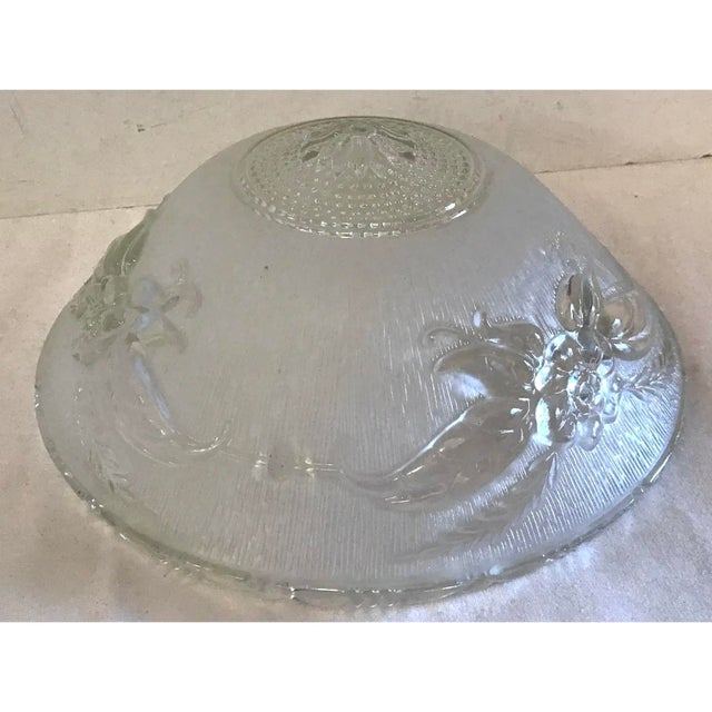 Beautiful glass three hole light fixture cover with floral and starburst design! Does not include fixture