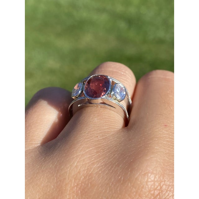 The Russeldale: Ladies Vintage Platinum Ring set with Topaz and Diamonds. This mid century modern ring features a central...