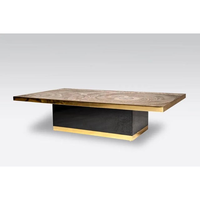 Coffee table etched brass inlay, Ammonite, circa 1970 and signed by Georges Mathias, perfect condition. This piece is...