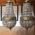 Gorgeous Brass and Crystal pair of miniature Chandeliers. Great for a countertop space or a vanity space. Perfect for the...