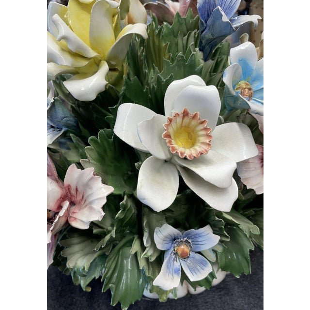 1970s Capodimonte Porcelain Floral Centerpiece. Hand-crafted and hand-painted glazed porcelain.. A dense, multi-layered...