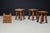 A characterful primitive oak stool from France, dating to the 1960s. with its substantial square seat, splayed legs and...