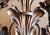 This splendid pair of three-light wall lamps is crafted from handcrafted wrought iron with a dark burnished finish,...