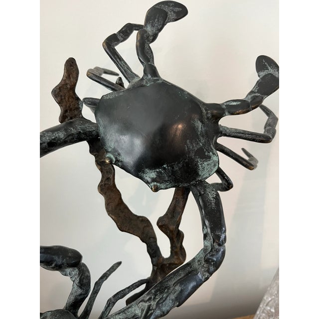 This beautiful undersea sculpture features two fighting crabs facing off on strands of kelp over a coral reef. The piece...