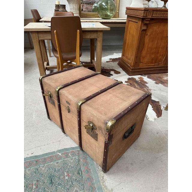 This 20th-century trunk is in very good overall condition. The corners are reinforced with brass. The interior was...