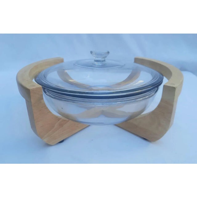 Mid-Century Modern 1970s Dolphin Beech Wood Cradle With Anchor Hocking Glass Baking Dish With Lid For Sale - Image 3 of 11