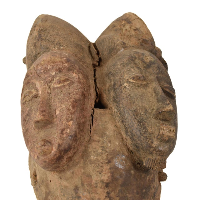 The Baule people, residing in CÃ´te d'Ivoire, West Africa, are renowned for their masterful artistry in crafting portrait...