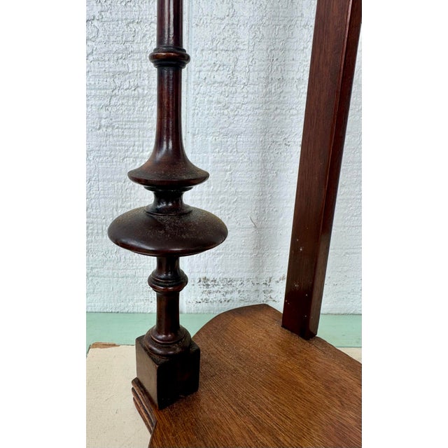 This pair of antique turned mahogany wall shelves are an elegant and classic set of wall-mounted storage/display pieces,...