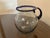 Vintage hand blown Mexican Glass Pitcher is trimmed in Cobalt Blue on the Rim and Handle. It is a beautiful piece of art...