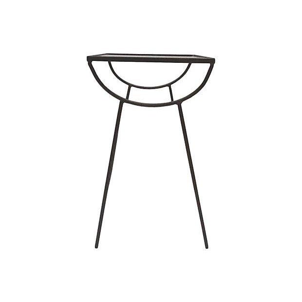 A Mid-Century Modern wrought iron side table with clear glass top from the 1950's. Dimensions-18.5?L x 12.5?W x 19.75?H...