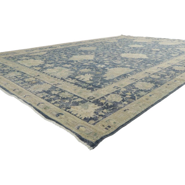 30711 Vintage Modern Blue Distressed Rug, 09'08 x 13'09. Immerse yourself in the enchanting beauty of this hand-knotted...
