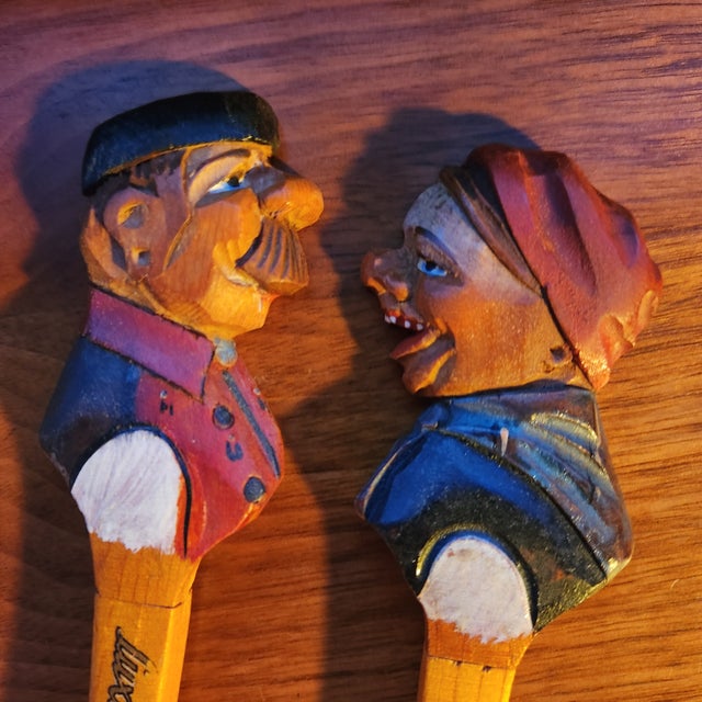 AMBIANIC presents 1950s stamped Luxembourg Hand Carved Wood Salad Server Set Man and Woman Folk Art attributed ANRI Italy...