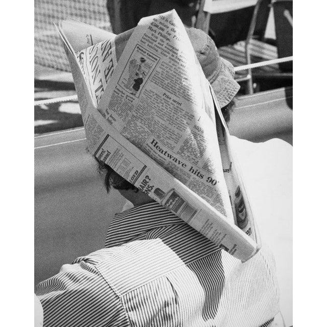 1976 Wimbledon Lawn Tennis Championships A tennis fan seeks protection from the sun of a British summer heatwave by making...