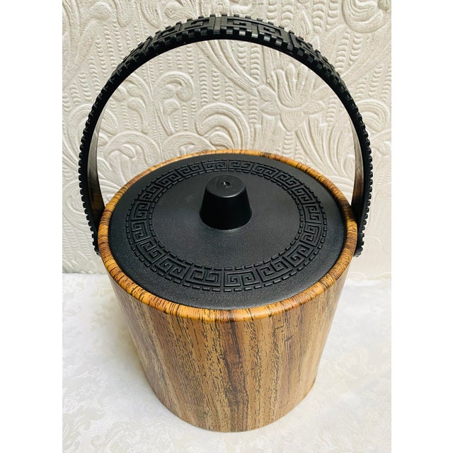 This MCM Greek Key Ice bucket appears to have never been used , and is waiting to decorate your MCM bar!