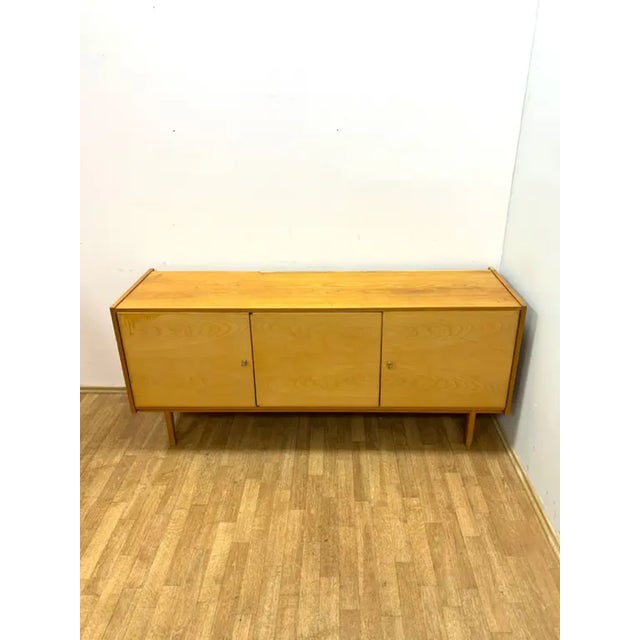 A stylish and timeless retro chest of drawers produced in Czechoslovakia in the 1960s, designed in the iconic Brussels...