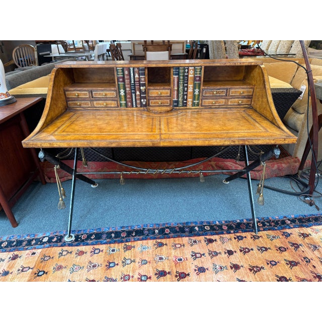 Design Plus Gallery presents a Leather Clad British Campaign Desk with Steel Sword Base by Maitland-Smith. The desk is...