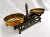 Antique cast iron balance scales. Imported from Europe. Amazing time earned patina on the iron scale and the brass bowls....
