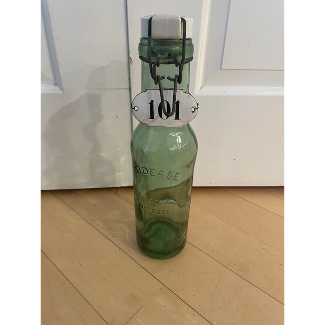 French Antique l'Ideale Bottle With Porcelain Top For Sale - Image 12 of 12