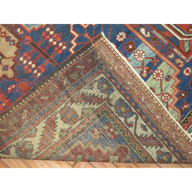 Early 20th-century Tribal Persian Bakhtiari rug in rare gallery format. Measures: 5'4" x 10'1".