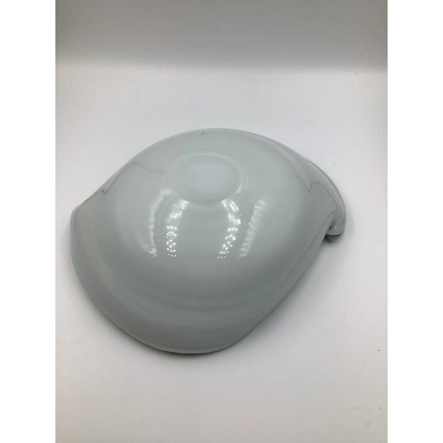 Gorgeous mid Century cased Murano glass bowl that is an elegant pale grayish sage green color. It measures 7 1/2” long and...