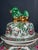 highly decorative Chinese Rose Medallion style enameled porcelain covered urn, richly decorated with colorful figural...