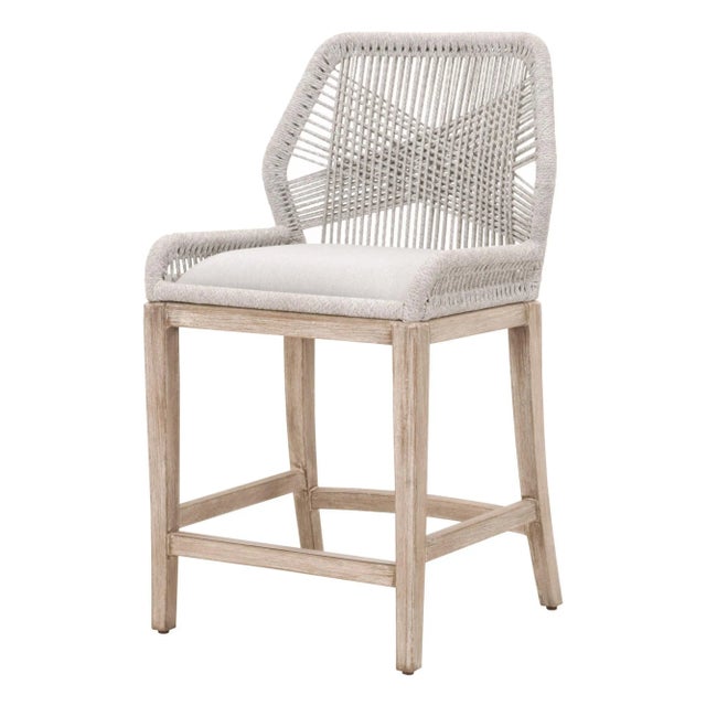 This woven counter stool will add a touch of coastal style to your kitchen, bar or dining space. Constructed with a...