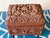 Fascinating one-of-a-kind 1940s cigarette box from beautifully hand-carved wood. Unfolds into a dispenser with slots for...